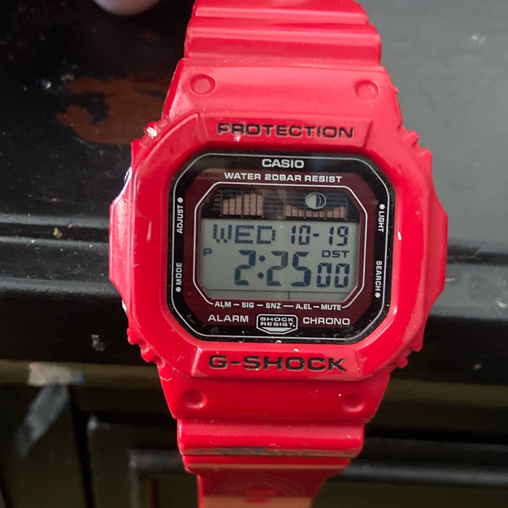 G SHOCK watch red in color digital numbers with date and time. Water resistant